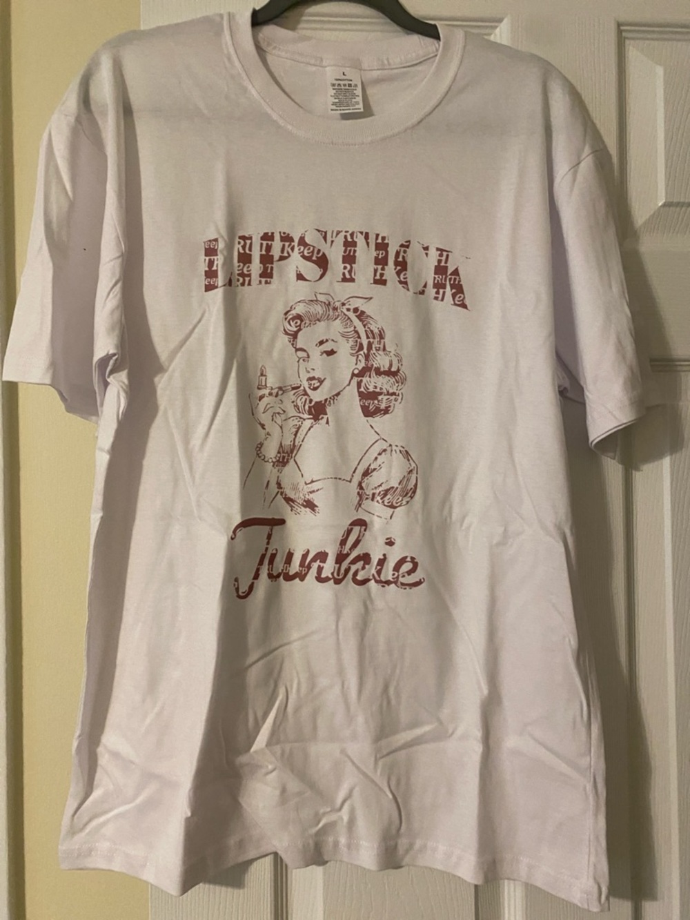 Graphic 'Lifestyle Junkie' White Tee with Red Print

Never worn